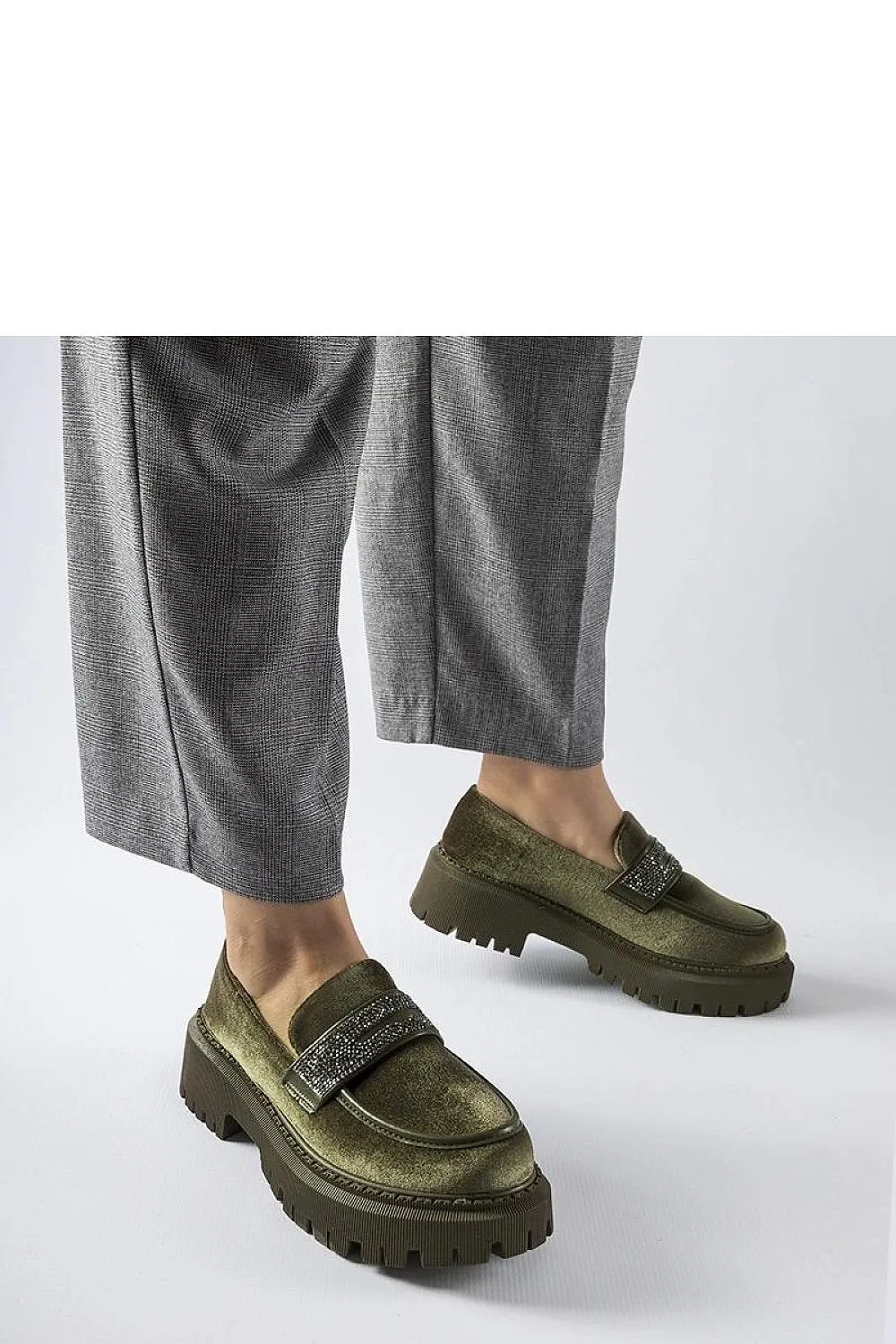 Green moccasins adorned with zircons